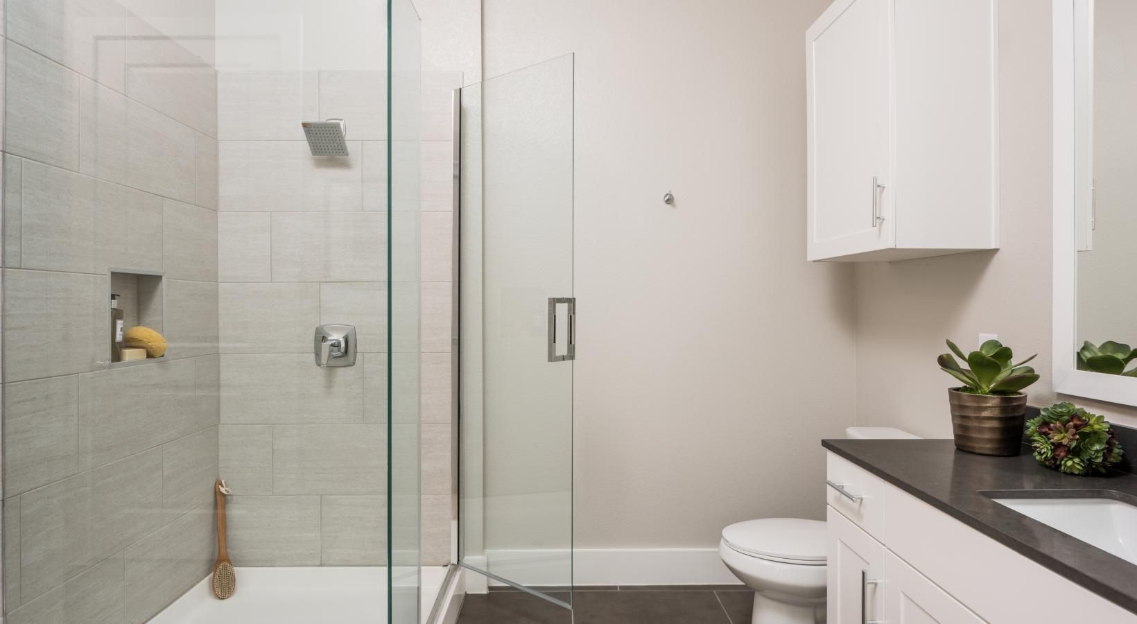 Spacious bathrooms with everything you need a bathroom with a glass shower