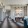 a room with a couch and chairs