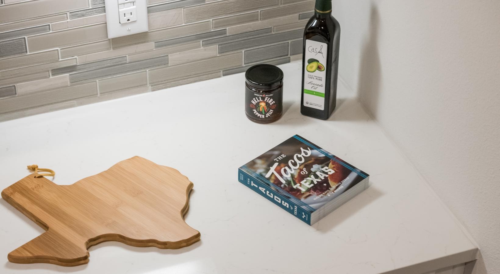Settle into comfort at Tinsley on the Park a bottle of wine on a counter