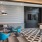 a living room with a couch and chairs