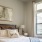 a bedroom with a ceiling fan