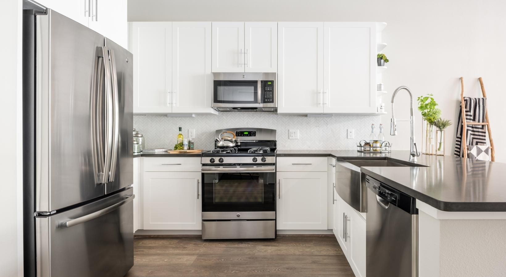 Beautiful kitchens with designer finishes a kitchen with white cabinets