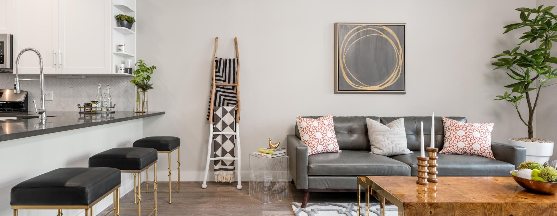 a living room with a couch and a table