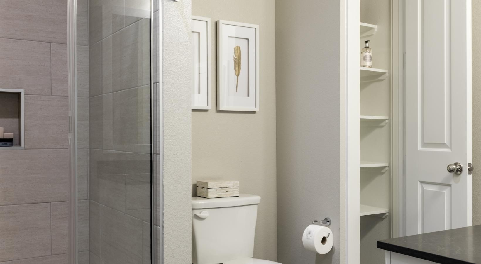 Spacious bathrooms with everything you need a bathroom with a glass shower