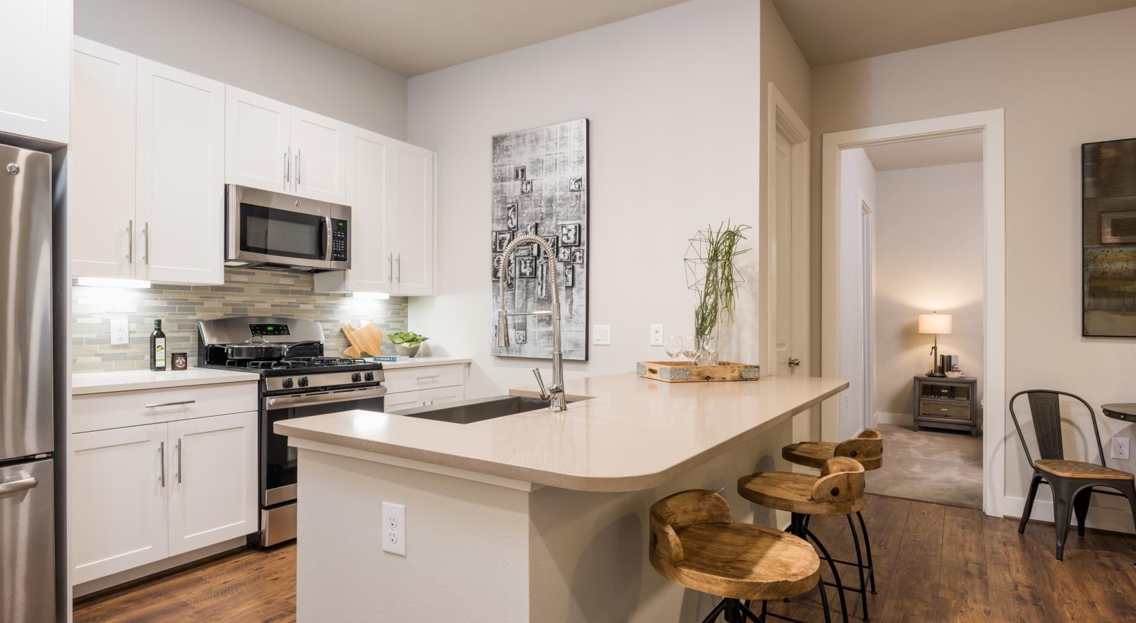 Beautiful kitchens with designer finishes a kitchen with white cabinets