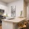 a kitchen with white cabinets