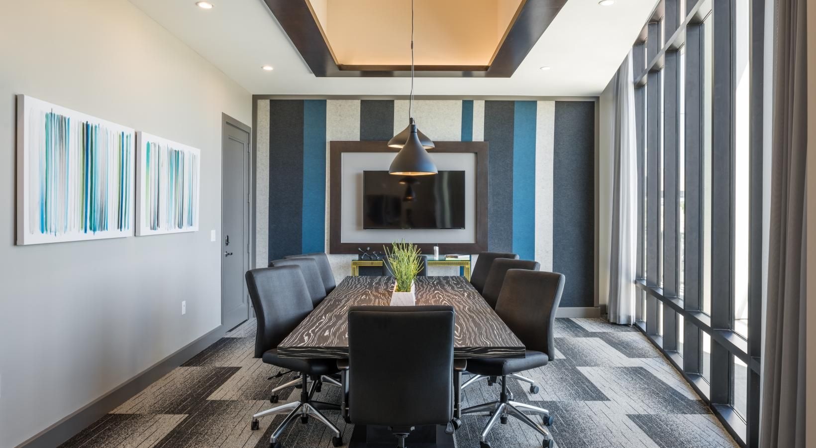 Access to resident-only features a room with a table and chairs