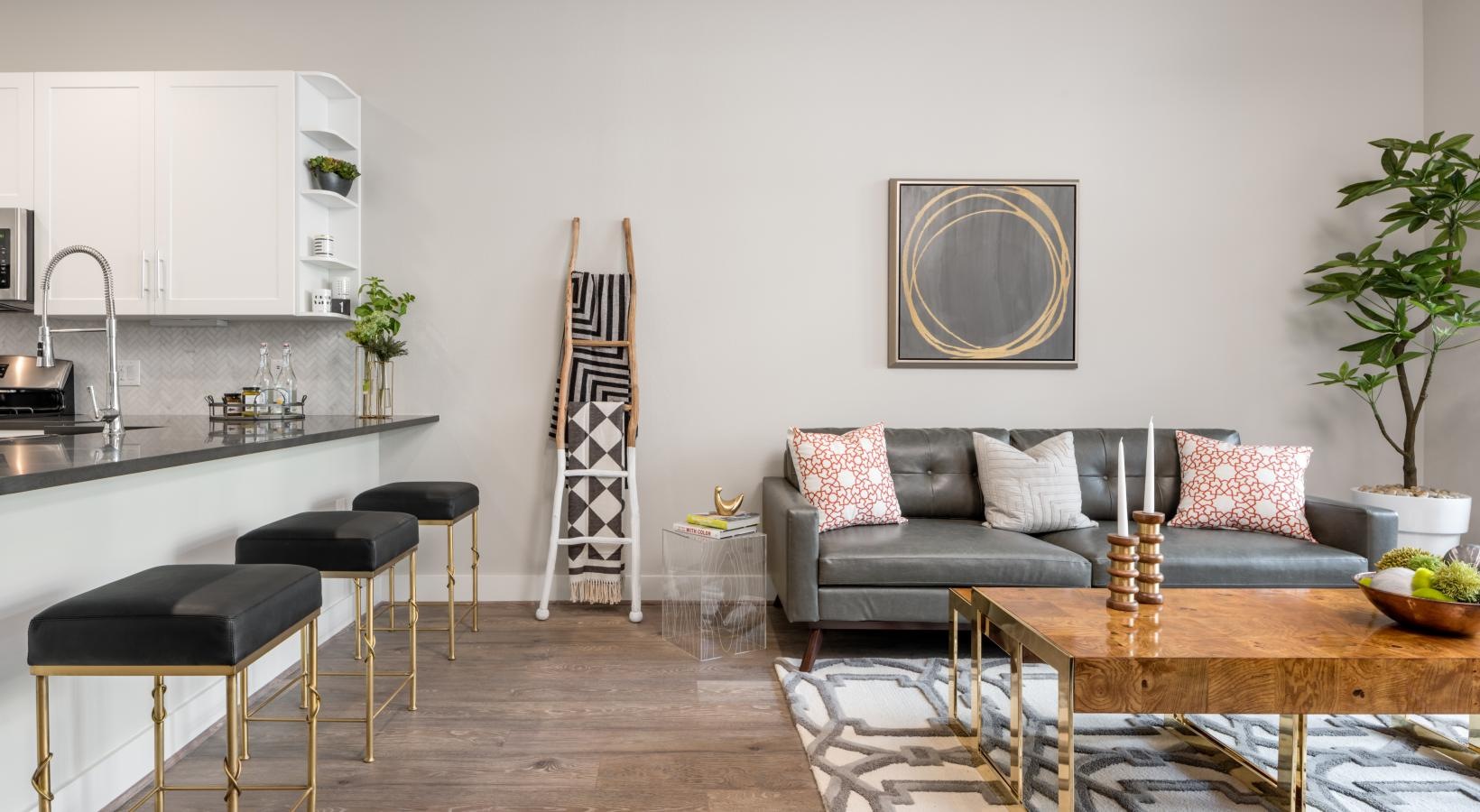 Spacious living areas to recline and recharge a living room with a couch and a table
