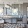 a kitchen with a marble island