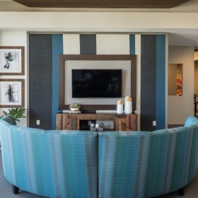 Settle into comfort at Tinsley on the Park a room with a tv and a table